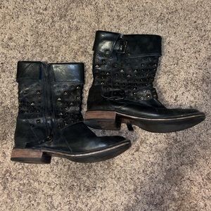 Leather UGG boots. Similar to a combat boot.